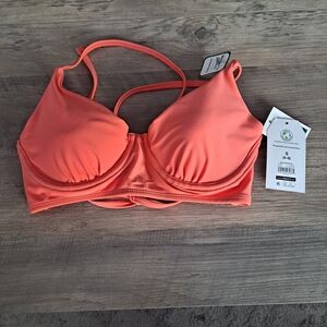 This vibrant bikini top  Time and Tru